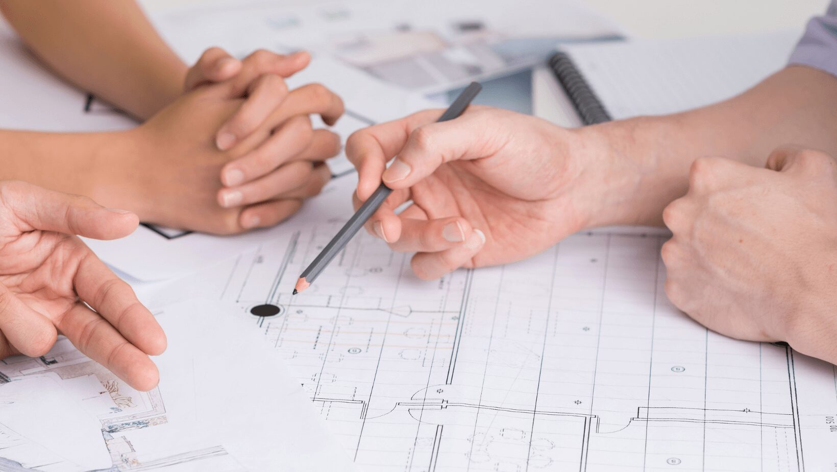 Security consultants reviewing a building plan