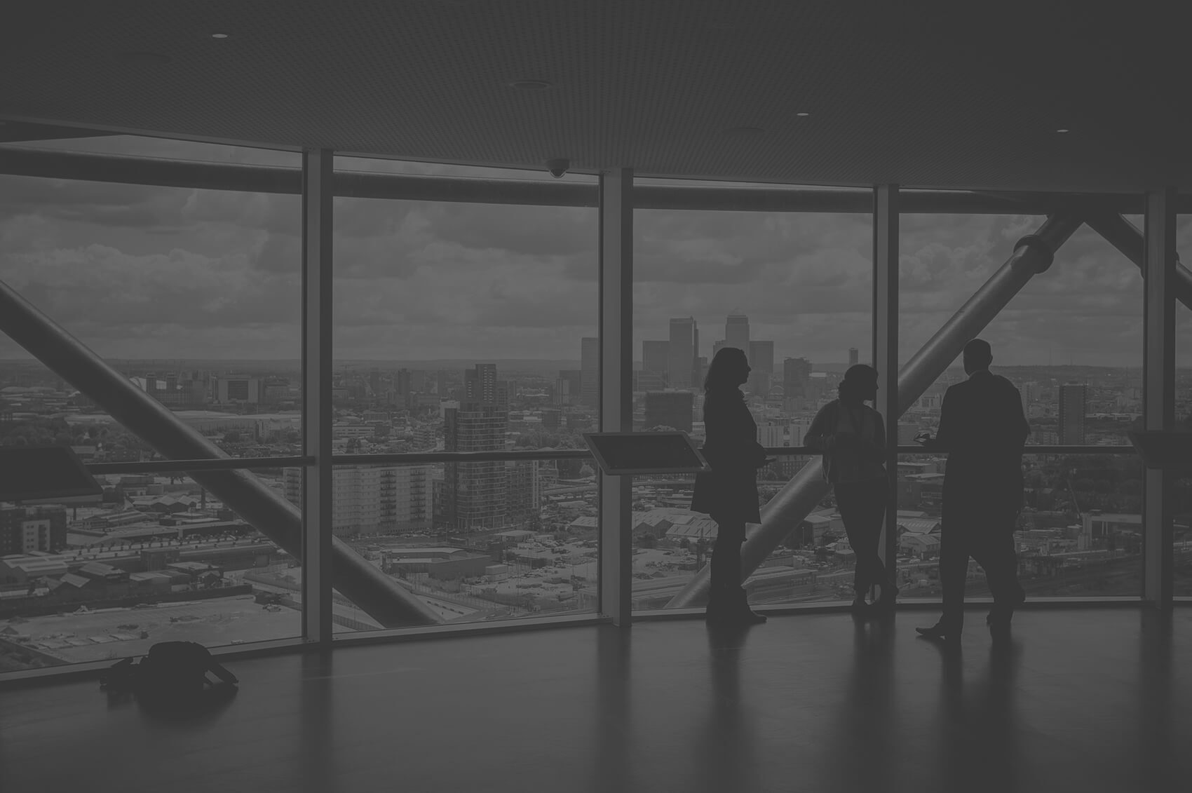 People in a modern office building lobby